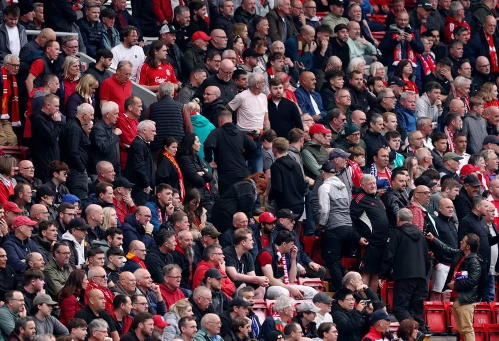 Liverpool fans stream out of Anfield early during the draw with Chelsea on Saturday afternoon